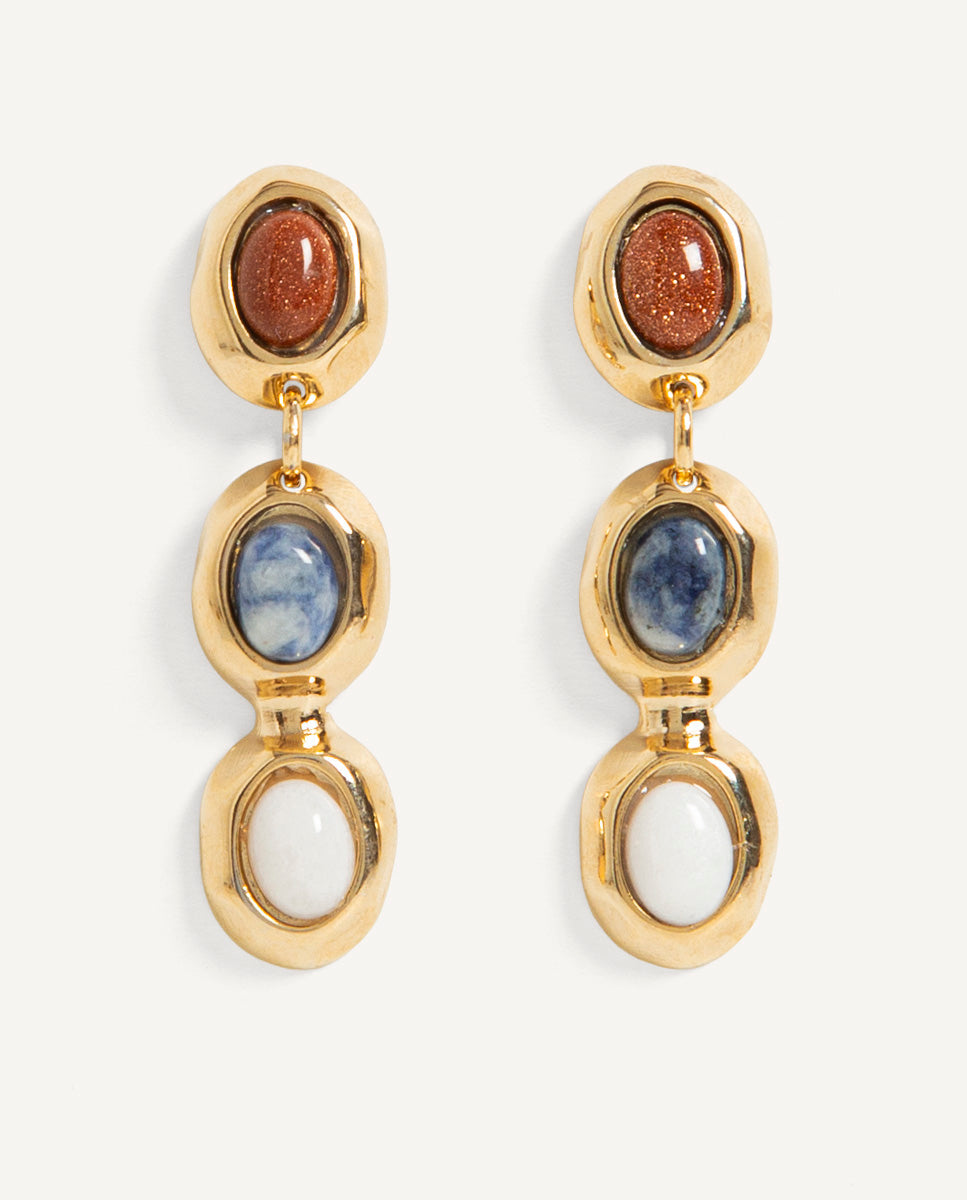 Pendientes Soiret de Emolo con sodalita azul y piedras ovaladas color cobre y blanco en engastes dorados