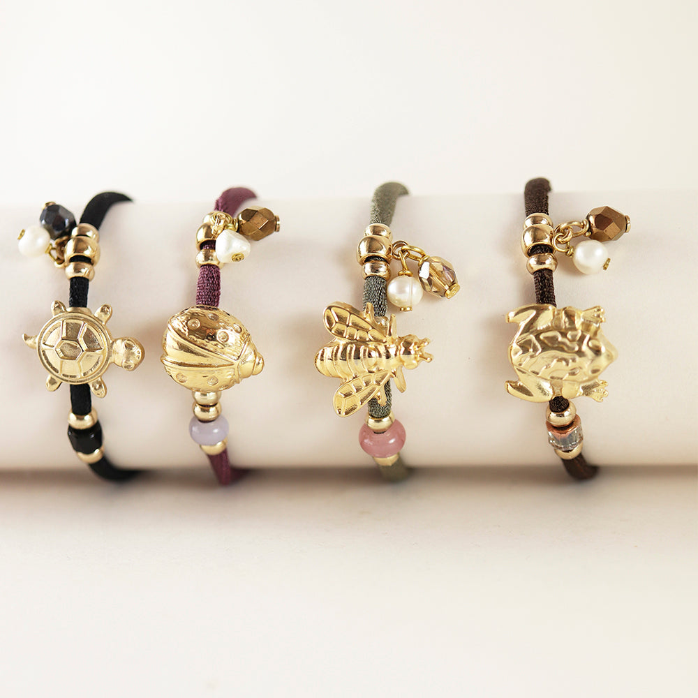 Pulseras ajustables para mujer con piezas doradas con formas animales
