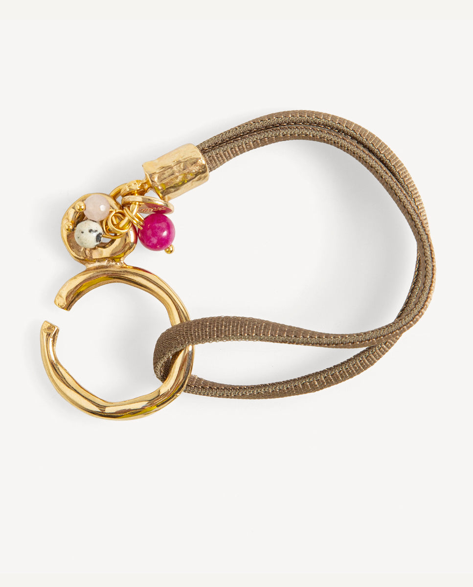 Pulsera Sasha topo de Emolo con cordón doble marrón grisáceo, aro dorado y pequeñas cuentas de colores