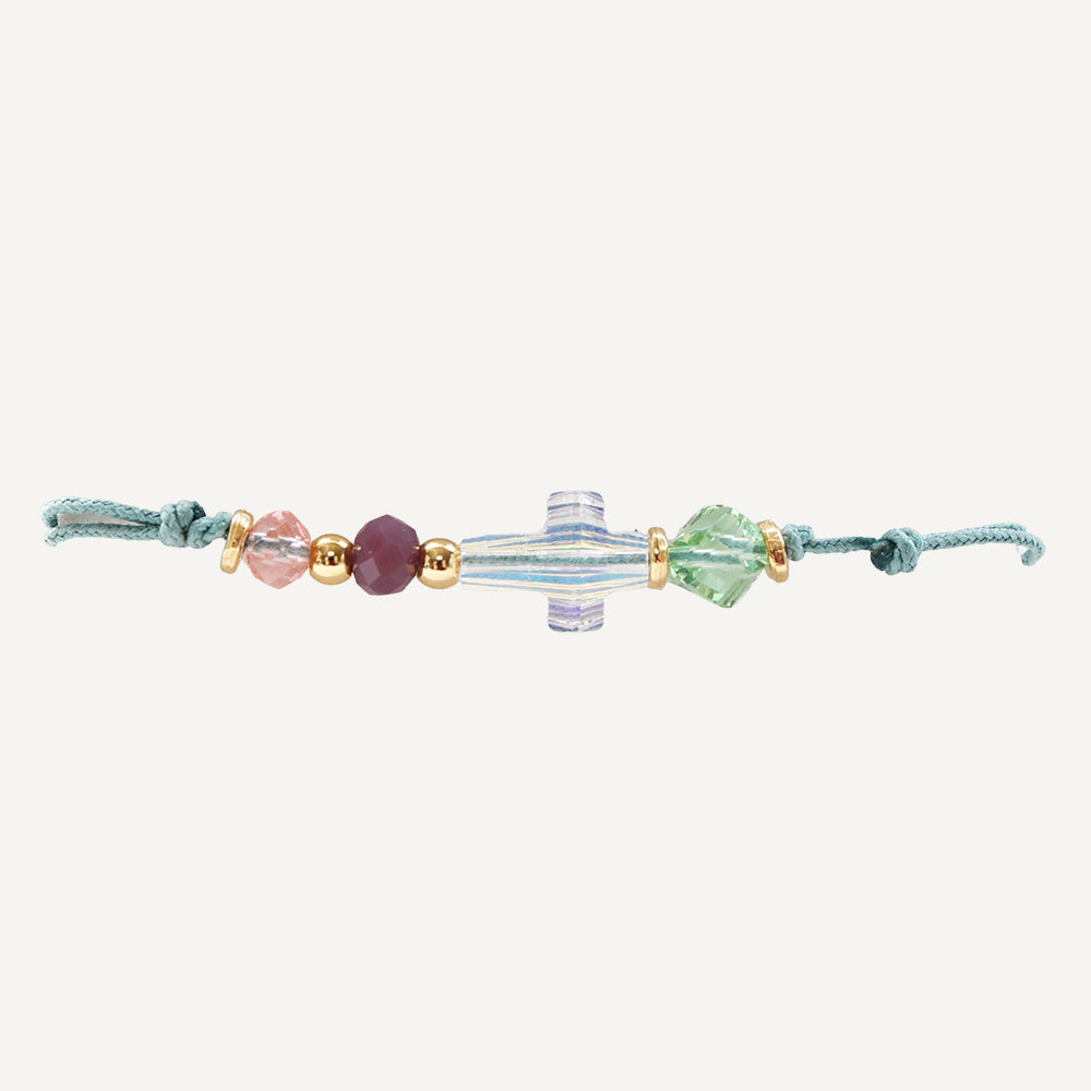 Pulsera para mujer con cruz de Swarovsky y cordón ajustable color azul