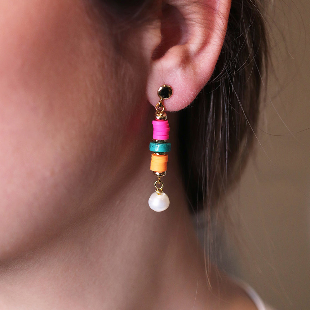 Long fluorescent earrings by Émolo