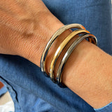 PULSERA RIGIDA DORADA PLATA GRAFITO ÉMOLO