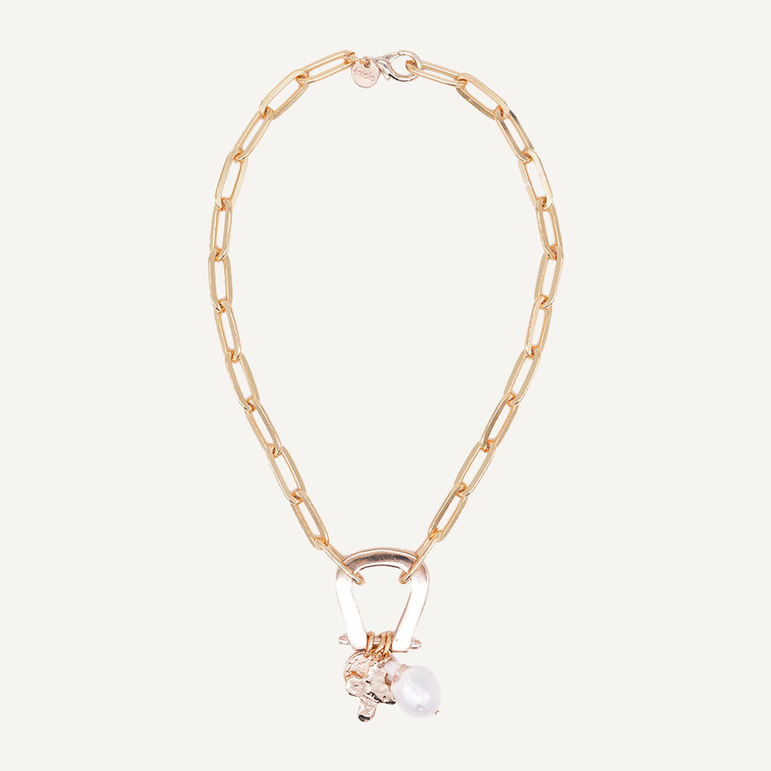 gold chain necklace and large pearl