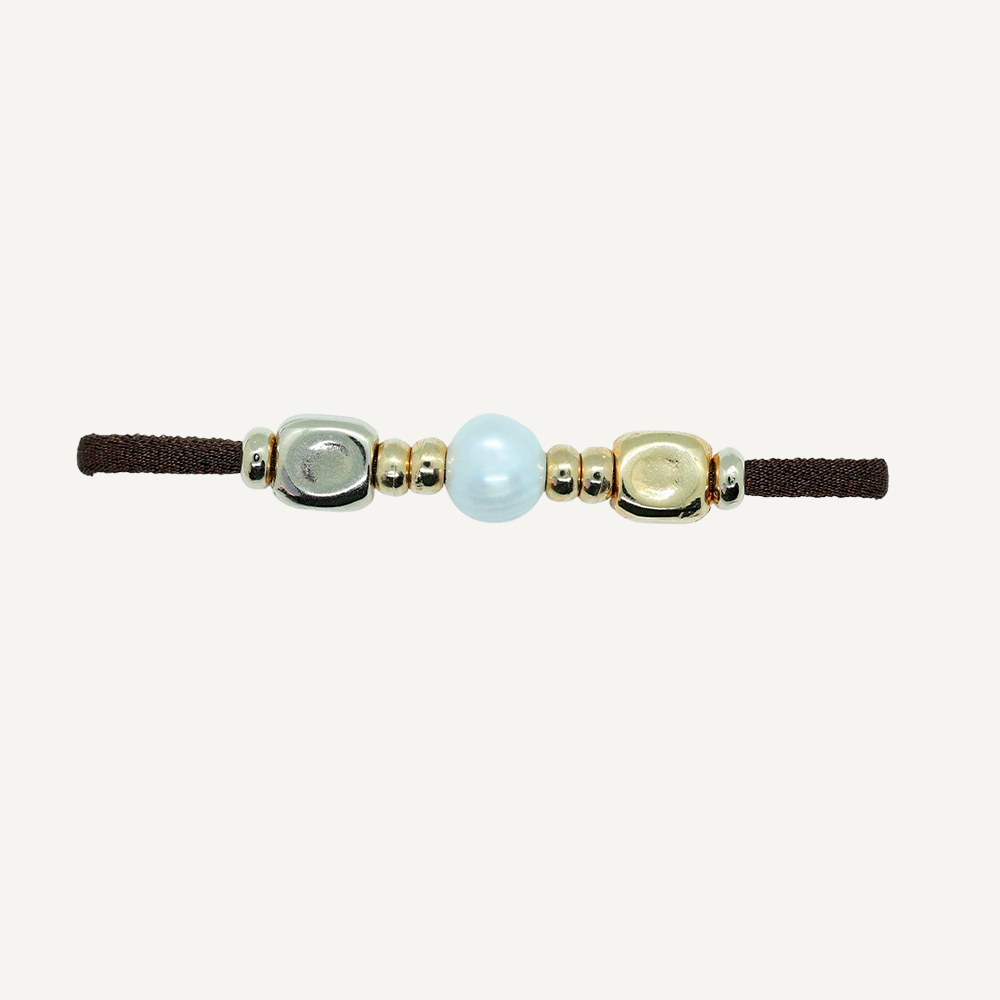 Bracelet with pearl and gold pieces for women