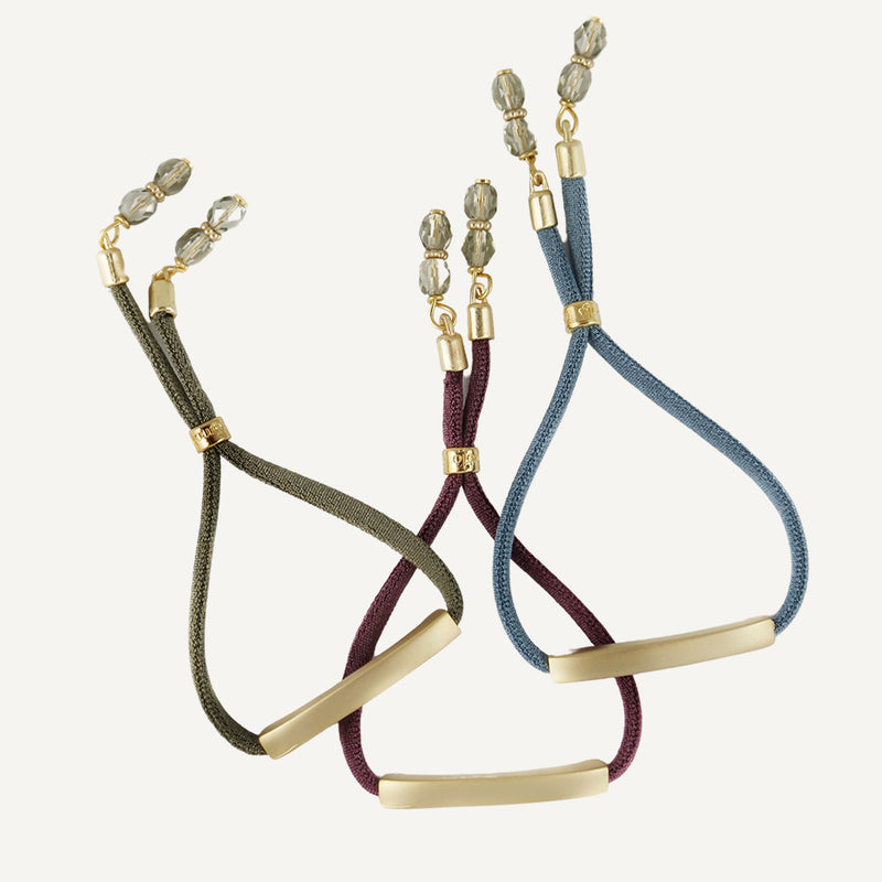 Pulseras ajustables para mujer con pieza dorada forma rectangular