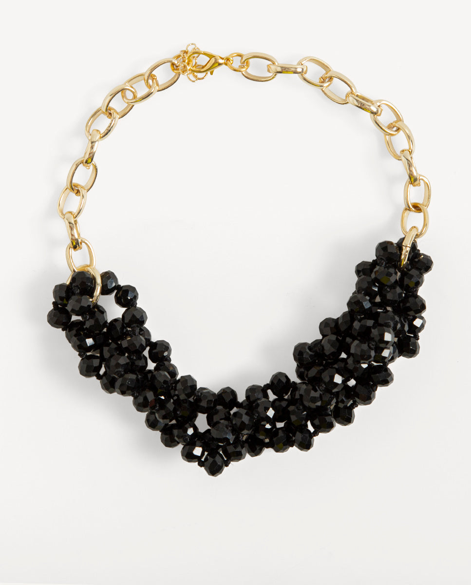 Collar Odri Sienna negro de Emolo con varias hileras de cuentas negras facetadas y cadena de eslabones dorados