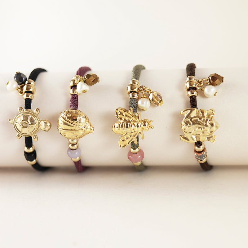 Pulseras ajustables para mujer con piezas doradas con formas animales
