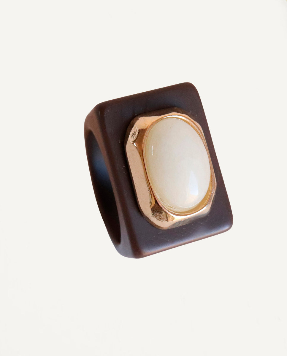 Women's brown ring with white jade