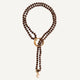 Collar largo ODRI Barroco fumé de Emolo con cristal de roca facetado, aro dorado y perla barroca