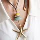 Macao Monsul star necklace in turquoise, star pendant and wooden beads on a cord — Émolo