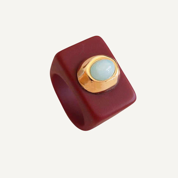 Anillo mujer burdeos con turquesa