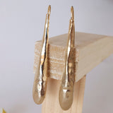 Pendientes dorados largos para mujer cierre de gancho