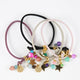Miz Estrellita bracelets in several colours with golden star — Émolo