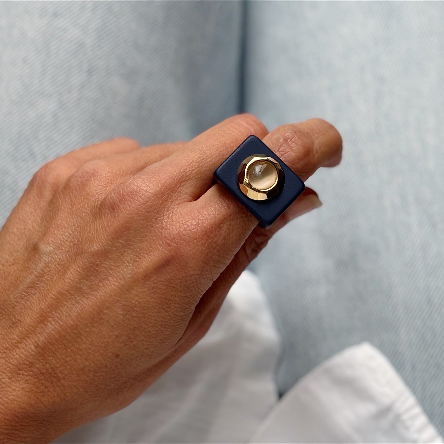 Large navy blue ring with natural cat's eye stone