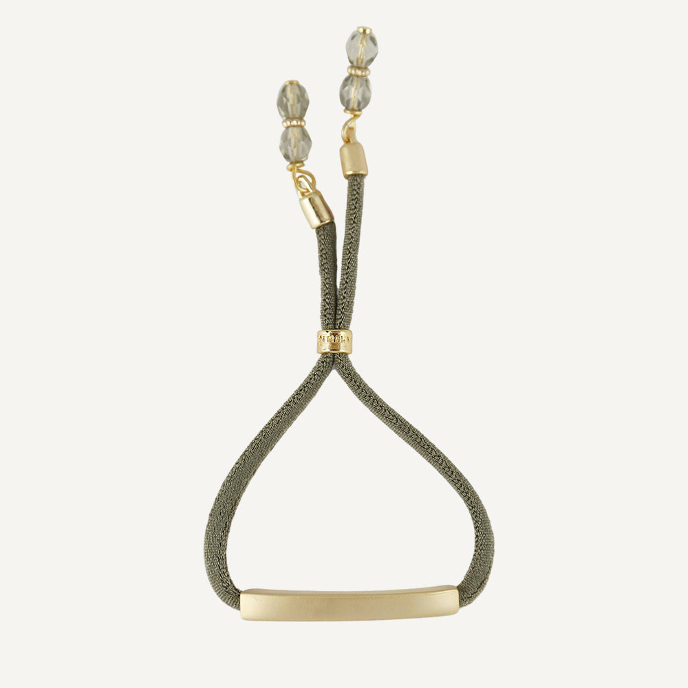 Elastic bracelet for women with a gold-tone piece