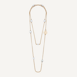 collar de cadena dorado con perlas grandes