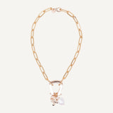 collar de cadena dorada y perla grande