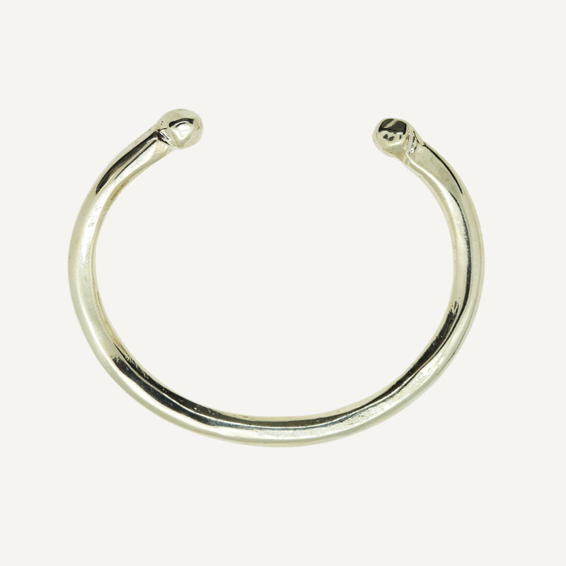 PULSERA RIGIDA DORADA ÉMOLO